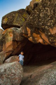 Boy exploring Cave Trail