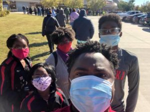Encouraging your family to vote: the author and her family in line to vote in 2020.