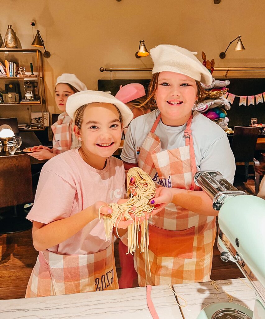 Budding chefs learn how to make pasta at Cosabella Kitchen. 