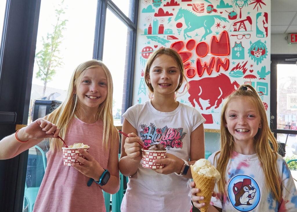 Kids nosh on scoops of ice cream at Boomtown Creamy.
