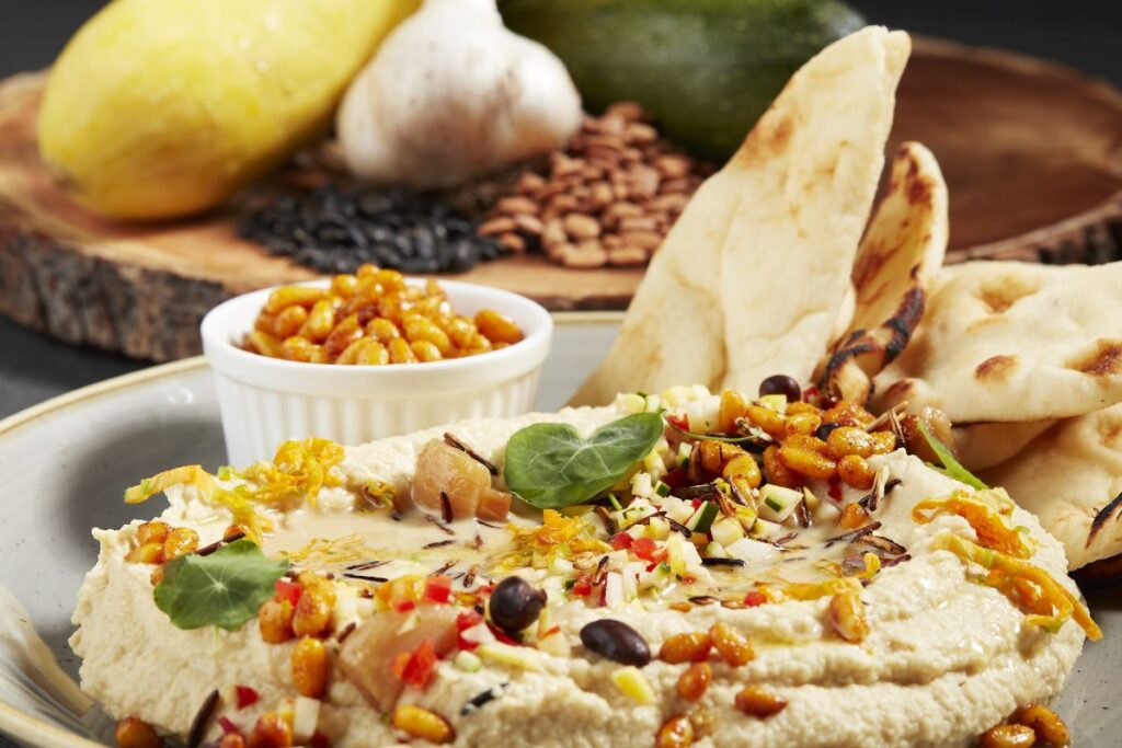 Chef Loretta uses authentic Native American ingredients such as hominy and white beans.